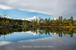 Clouds and sky over calm lake, Boundary Waters Canoe Area Wilderness, Minnesota