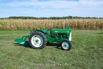 1961 Oliver 550 with Oliver mounted 16-inch two-bottom plow