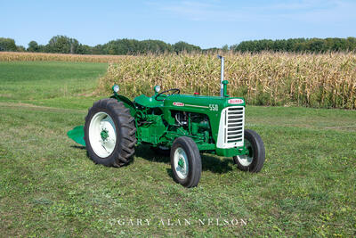 1961 Oliver 550 with Oliver mounted 16-inch two-bottom plow