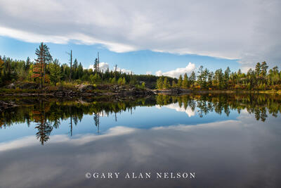 Clouds and sky over calm lake, Boundary Waters Canoe Area Wilderness, Minnesota