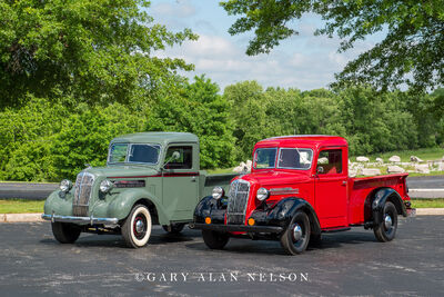 A pair of 1937 REO Speed Delivery Wagons