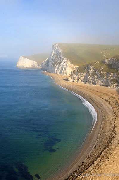 GB-11-30-ENG Fog and early morning light over  Bat's Head and Swyre  Head, Dorset, England, part of the Jurassic Coast World...