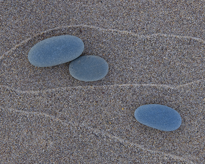 MI-11-63-LS Rocks and swash marks on a sandy Lake Superior beach, Michigan