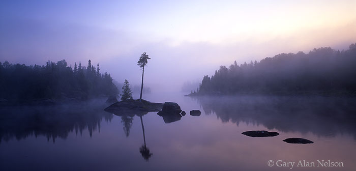 MN-98-48P-BW Calm water and fog on Lake Three, Boundary Waters Canoe Area Wilderness, Minnesota