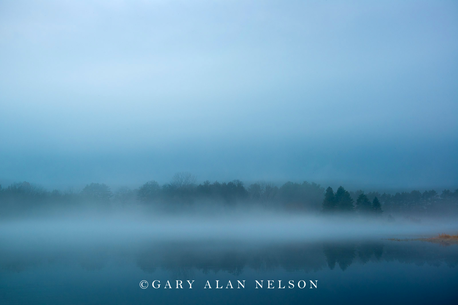 Clouds and fog over Bull Lake, Allemansratt Park, Lindstrom, Minnesota