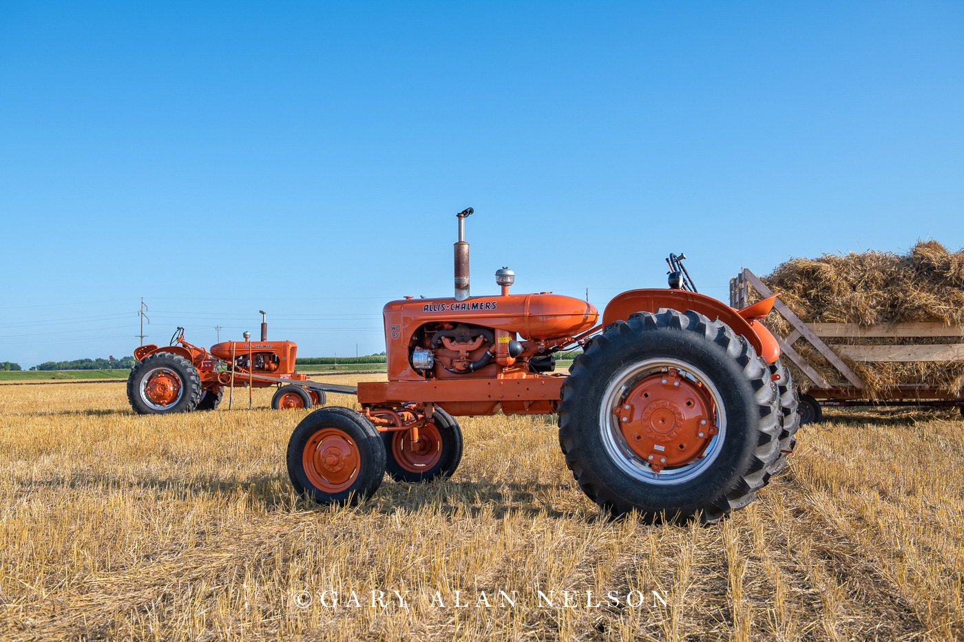1955 Allis-Chalmers Model WD-45 with 1951 Allis-Chalmers WD in background.