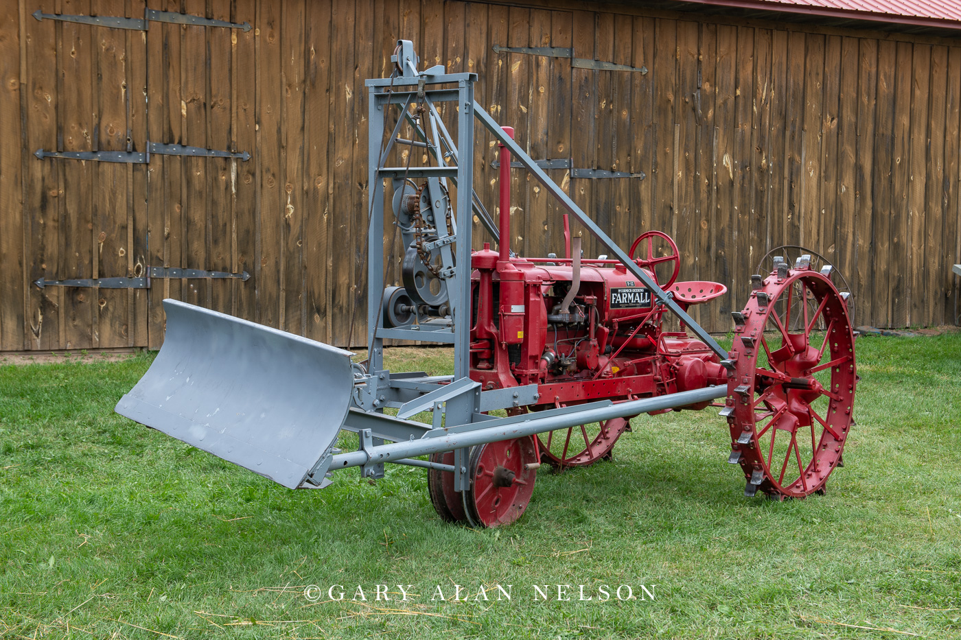 1935 Farmall F-12 with a cable driven loader with dozer blade