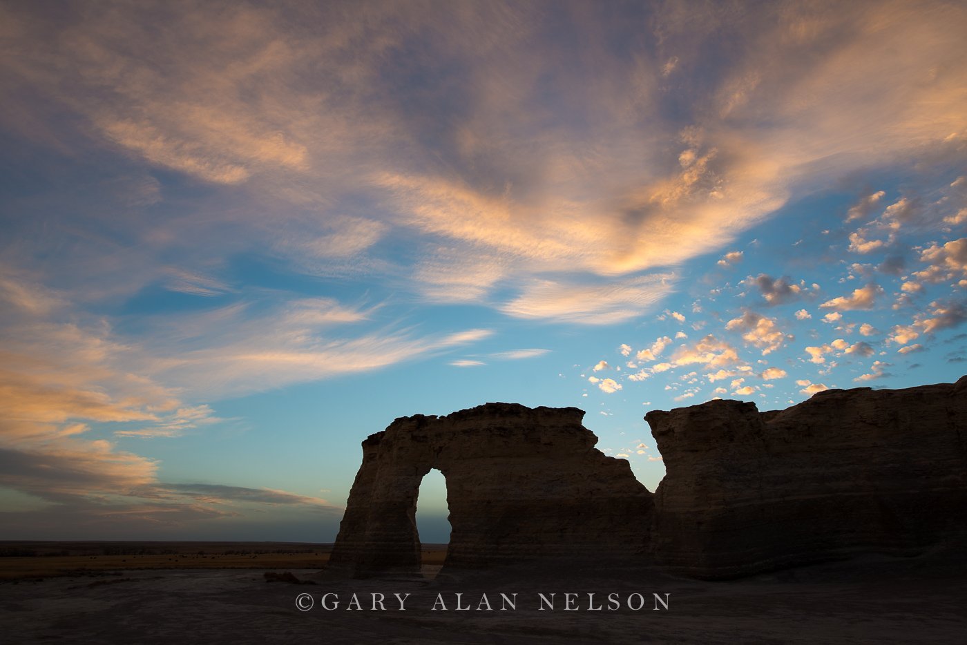 Monument rocks and keyhole arch at dusk, Monument Rocks National Monument, Kansas