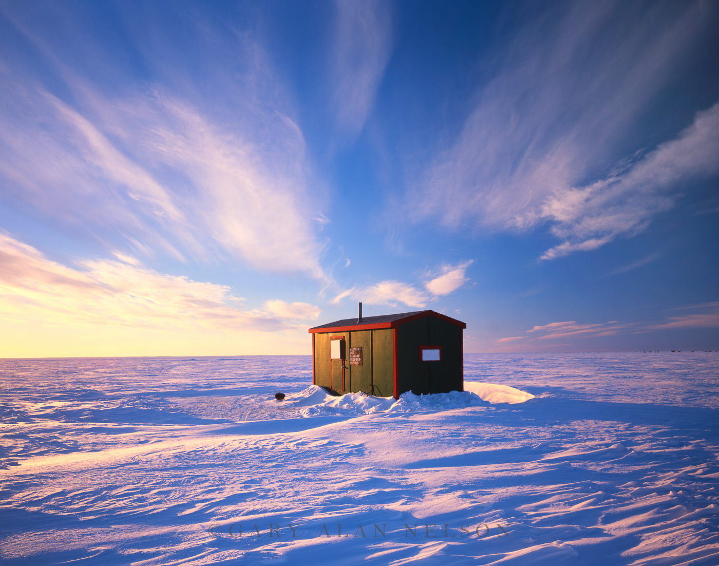 MN-00-3-RU Sculptured skies over ice fishing house and Mille Lacs Lake, Minnesota