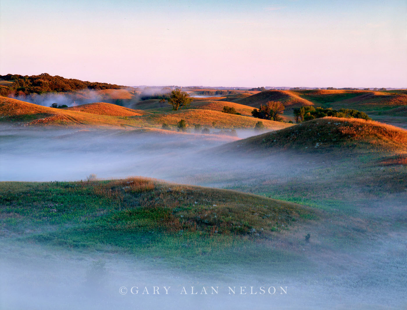 Low laying fog amidst the rolling glacial prairie landscpe of the Leaf Hills, Minnesota