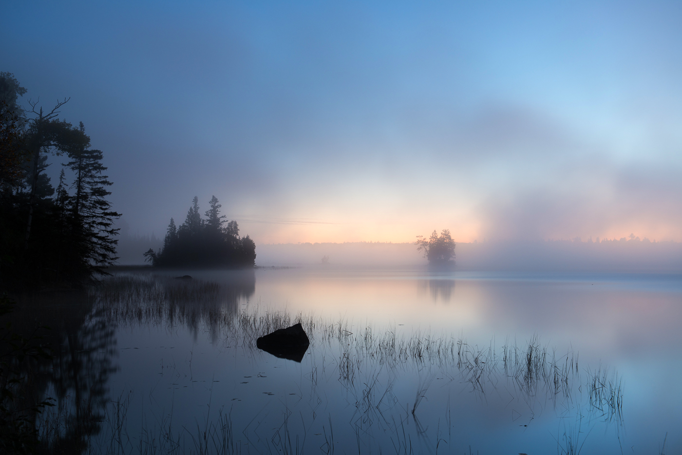 Fog and reflections at dawn, Birch Lake, Superior National Forest, Minnesota