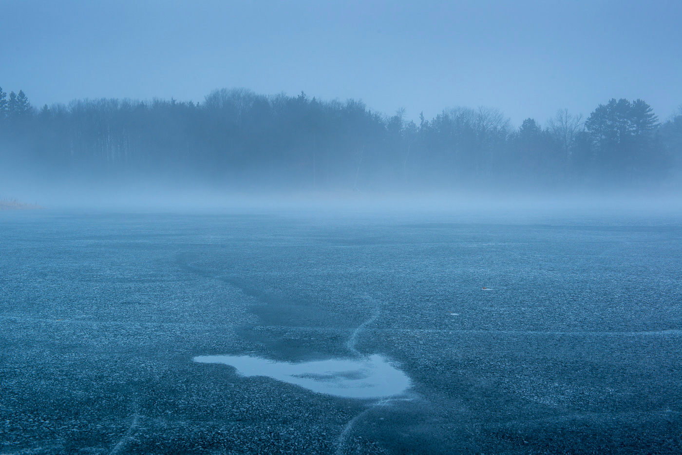 Ice and fog on Bull Lake, Allemansratt Park, Lindstrom, MN