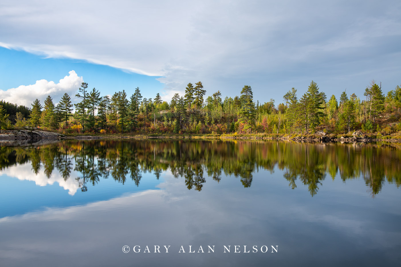 Clouds and sky over calm lake, Boundary Waters Canoe Area Wilderness, Minnesota