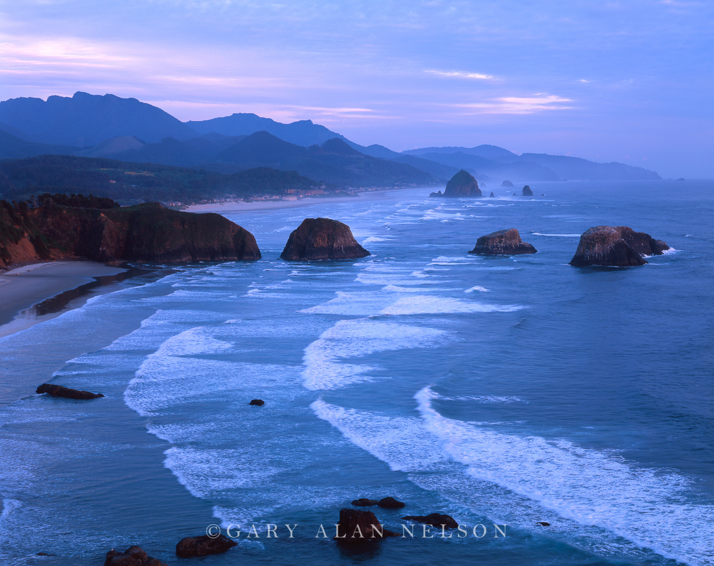 OR-03-3-SP The blues setttling on over the Pacific Ocean and seastacks, Cannon Beach, Oregon